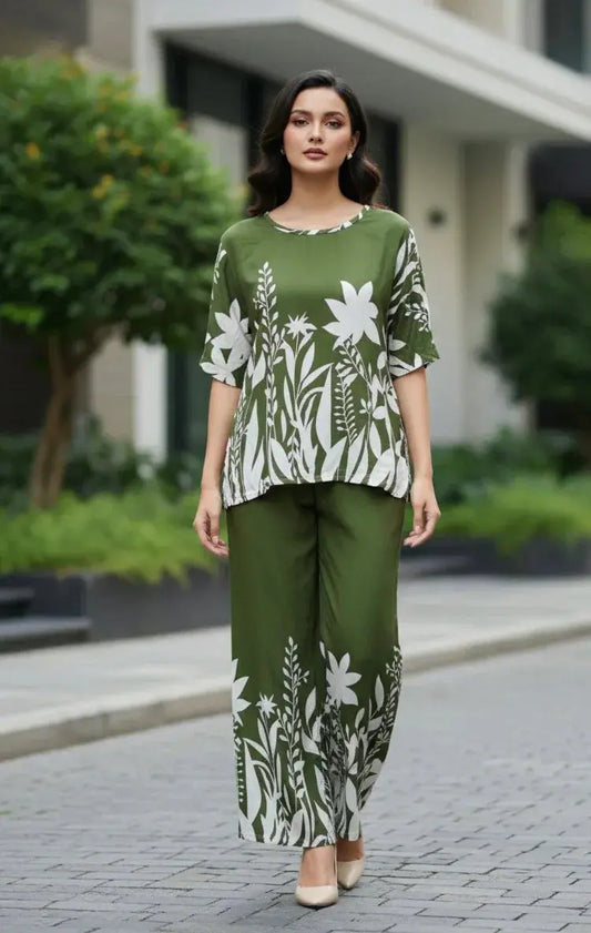 Woman wearing green floral printed ethnic co-ord set with wide leg pants outdoors