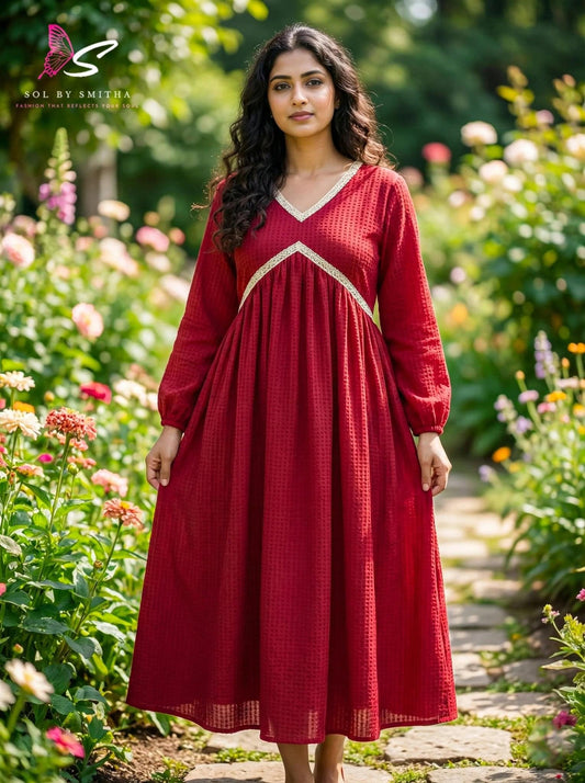 Ankle-length top from SOL BY SMITHA featuring a flowing fit and stylish design, displayed on a hanger against a neutral background.