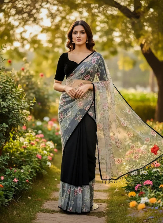 Black skirt saree by SOL BY SMITHA featuring a traditional drape with elegant fabric and intricate border details.