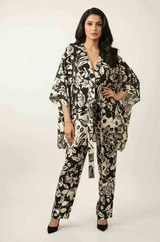 Black and green coord set by SOL BY SMITHA featuring a stylish matching top and pants ensemble.