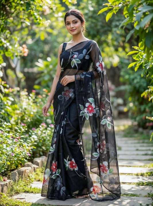 Midnight floral organza saree by SOL BY SMITHA, featuring intricate floral patterns and elegant draping.