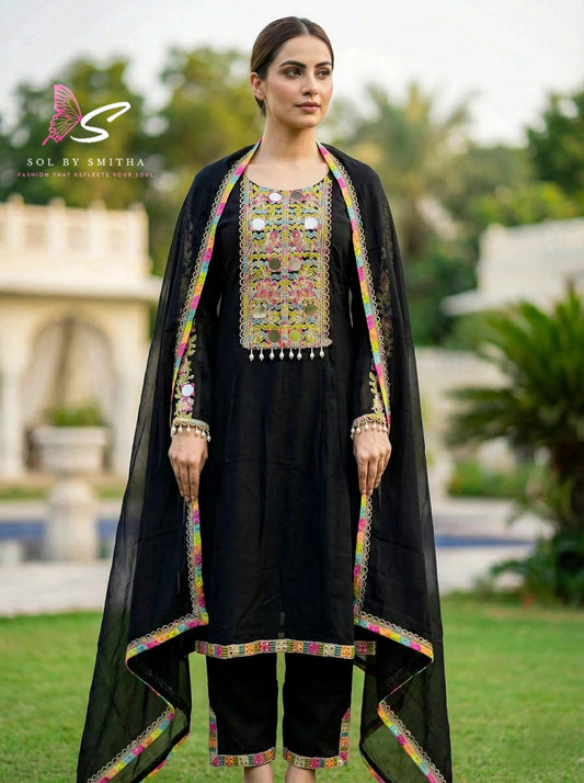 Three-piece mirror work suit set by SOL BY SMITHA featuring intricate mirror embroidery and traditional ethnic styling.