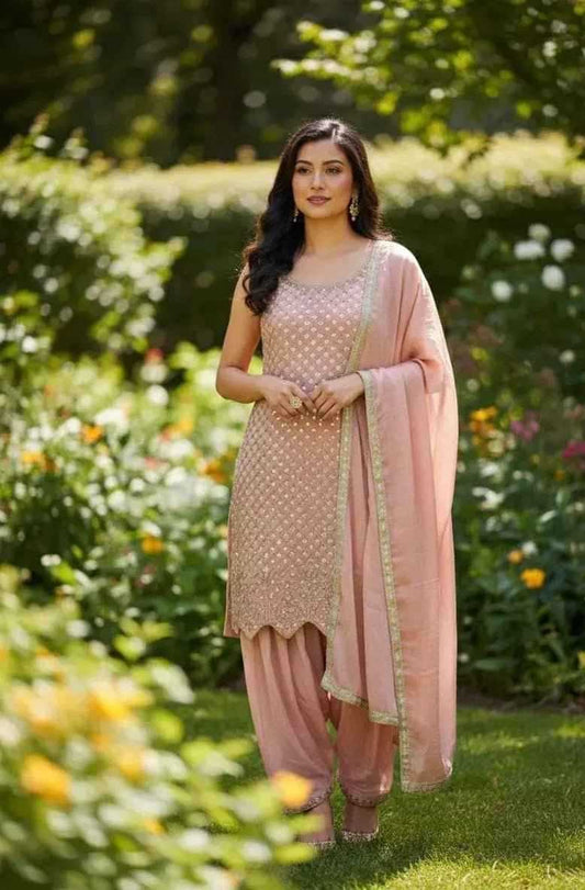 Peach Punjabi 3-piece suit set by SOL BY SMITHA featuring traditional embroidery and matching dupatta and churidar.