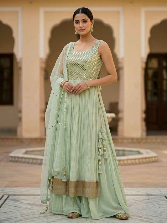 Pista green Lehenga set with matching dupatta by SOL BY SMITHA, featuring intricate embroidery and traditional design.