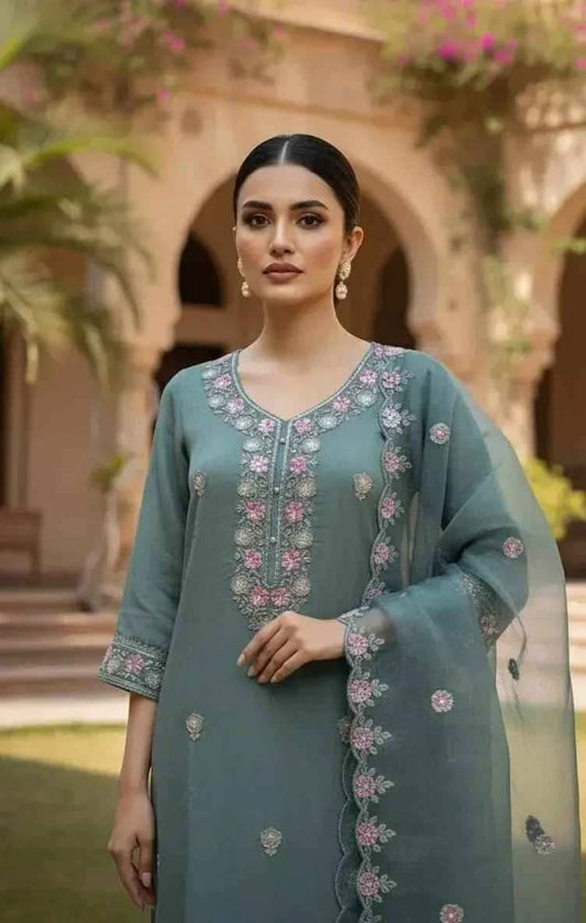 Sage green embroidered 3-piece suit set by SOL BY SMITHA with intricate embroidery and tailored fit.