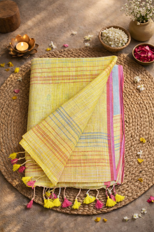 Yellow linen saree with pink border
