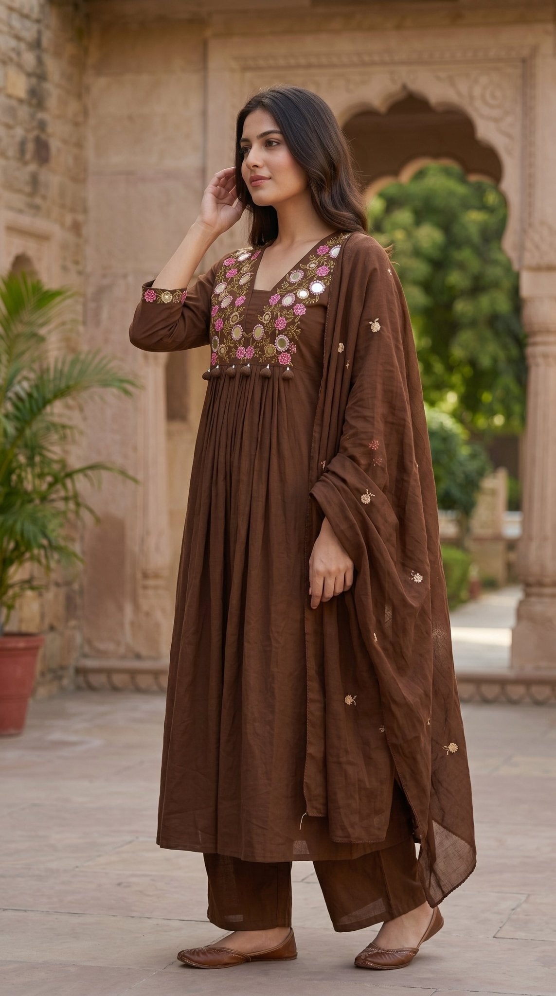 Brown Mirror Work 3-piece suit by SOL BY SMITHA, featuring intricate mirror embroidery on a traditional ensemble.