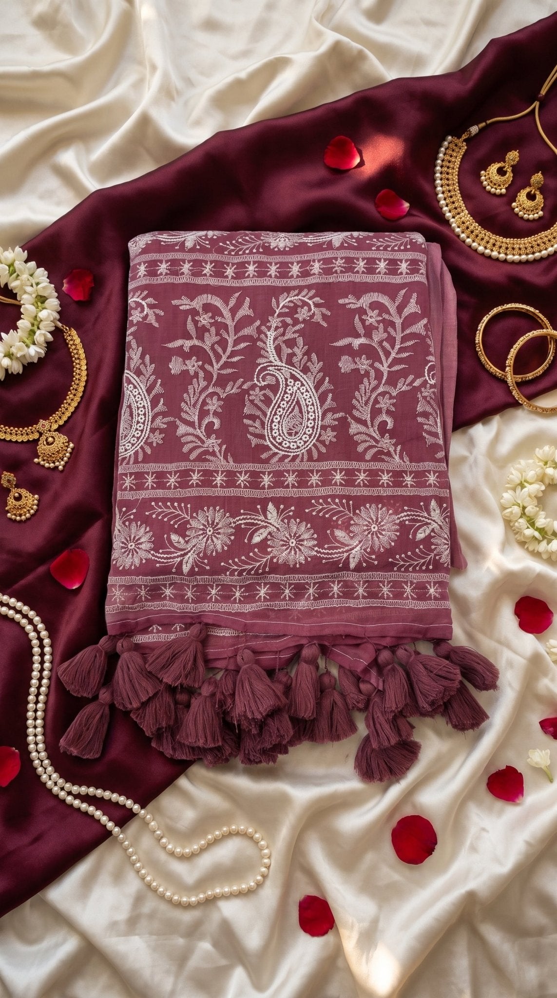 Chikankari machine-embroidered Mull cotton saree for women in traditional style, featuring intricate embroidery and lightweight fabric.