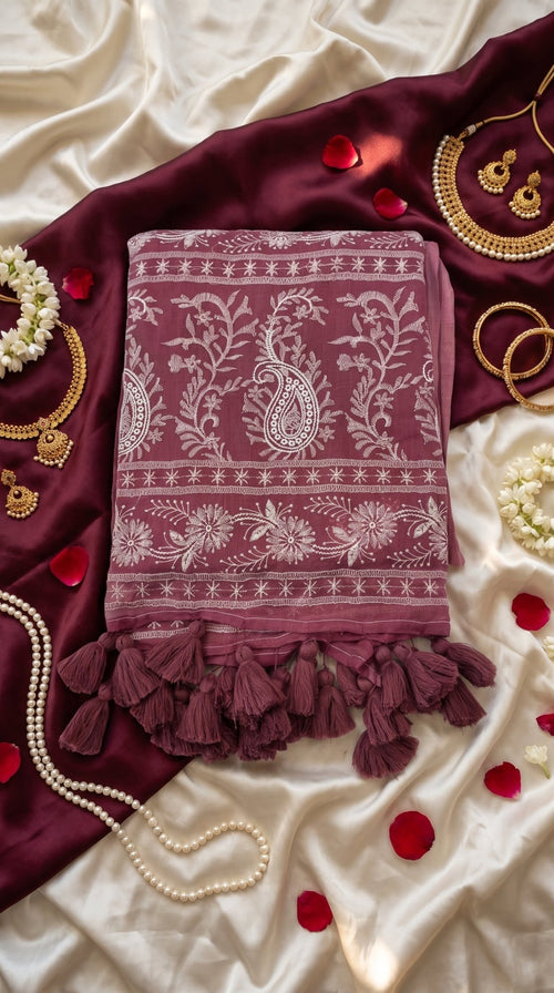 Chikankari machine-embroidered Mull cotton saree for women in traditional style, featuring intricate embroidery and lightweight fabric.