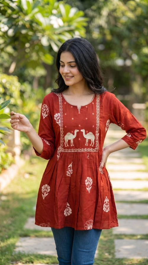 Short cotton kurti by SOL BY SMITHA, featuring a comfortable, casual design with traditional Indian patterns.