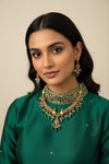 Elephant dollar side view featuring green and red drops, by SOL by Smitha, showcasing colorful decorative details.