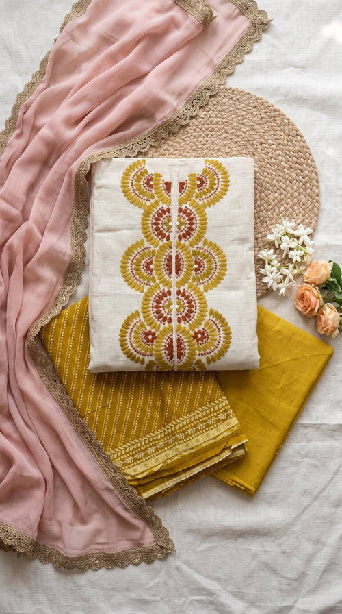 Khadi cotton unstitch suit by SOL BY SMITHA, featuring traditional fabric and vibrant colors, displayed on a mannequin.