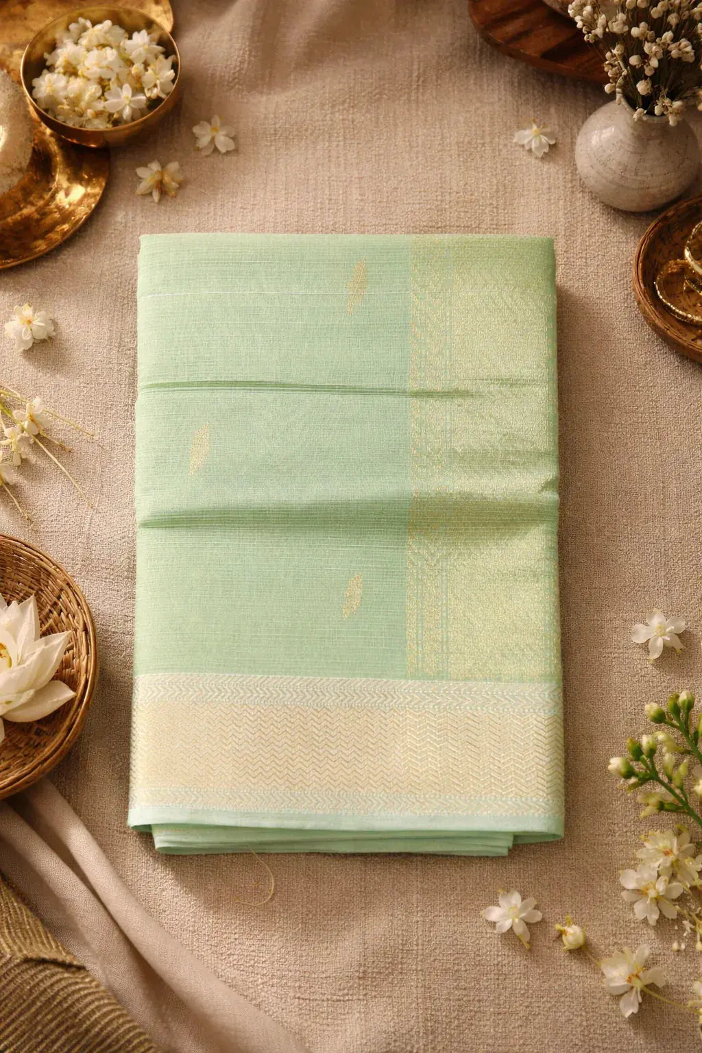 Kota tissue silk pista green saree with subtle gold detailing by Sol By Smitha Dubai