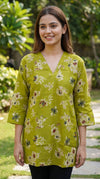Mehandi green cotton short kurti by SOL BY SMITHA with a round neckline and short sleeves, casual ethnic wear for women.