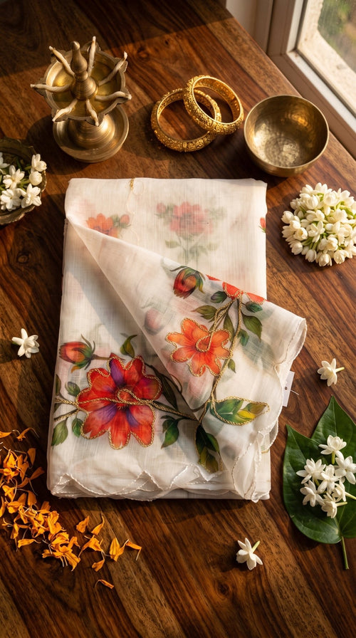 Light blue Muslin Cotton Saree from SOL BY SMITHA with intricate traditional patterns and soft, breathable fabric.